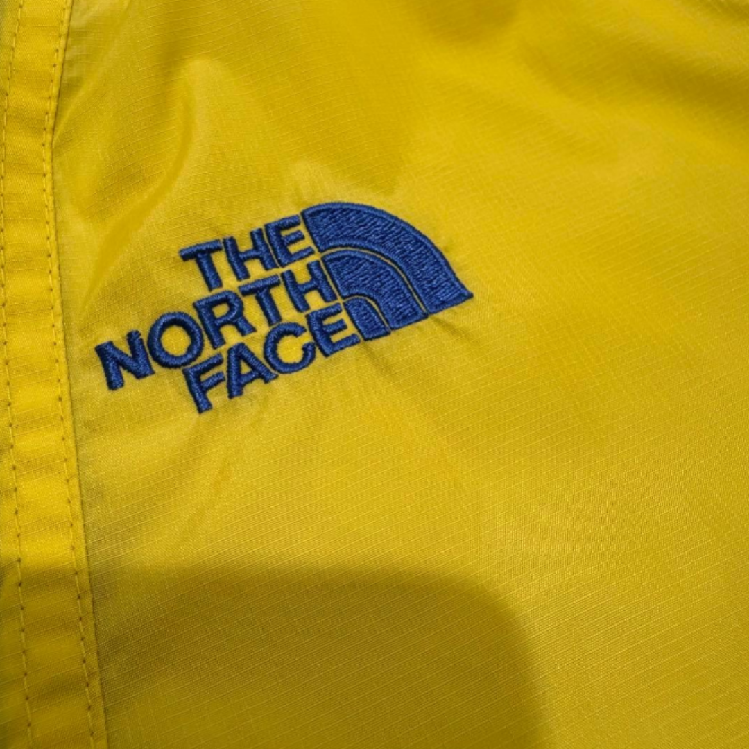 THE NORTH FACE マウンテンパーカー イエロー × ブルー S