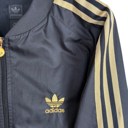adidas アディダス ジャージ TWISTED WW トラックジャケット ブラック × ゴールド L